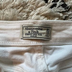 White, high waisted jeans. Very comfortable and soft